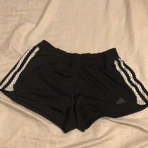 Black shorts with white stripes
